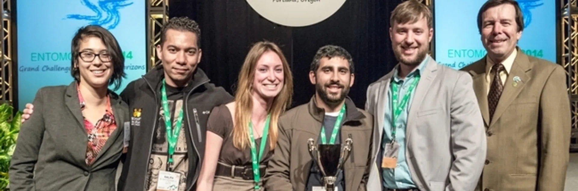 The UC Davis team included (from left) Margaret “Rei” Scampavia, Ralph Washington Jr., Jenny Carlson, captain Mohammad-Amir Aghaee and Danny Klittich. At far right is ESA president Frank Zalom of UC Davis who presented the team with its award. (Photo by Trav Williams of Broken Banjo Photography