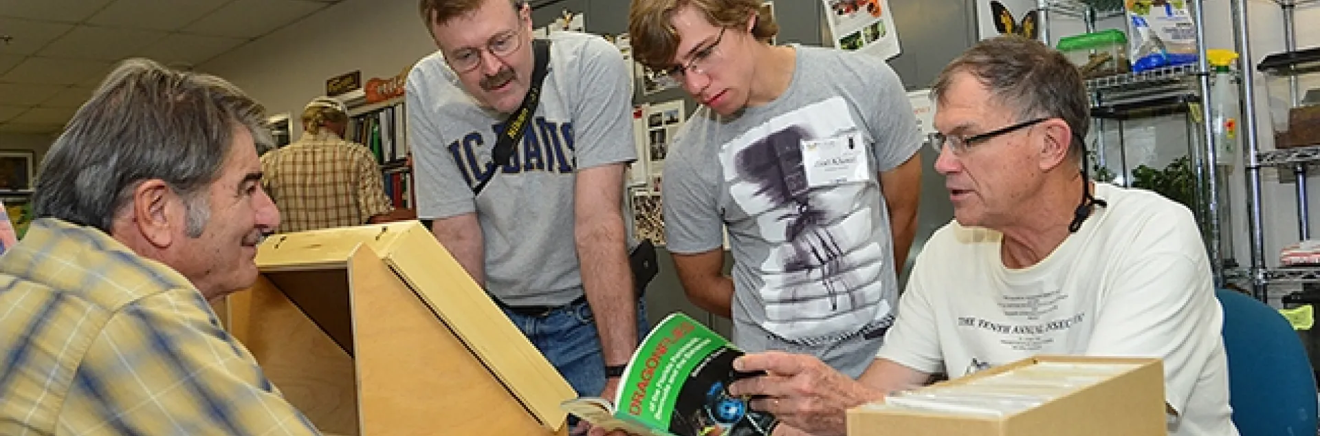 Dragonfly expert Rosser Garrison (far right) leads a discussion. From left are Bohart associate Greg Kareofelas; Bob Stahmer of Stockton, a UC Davis alumnus; and UC Davis entomology graduate student Ziad Khouri, who studies with Bohart director/UC Davis professor Lynn Kimsey. (Photo by Kathy Keatley Garvey)