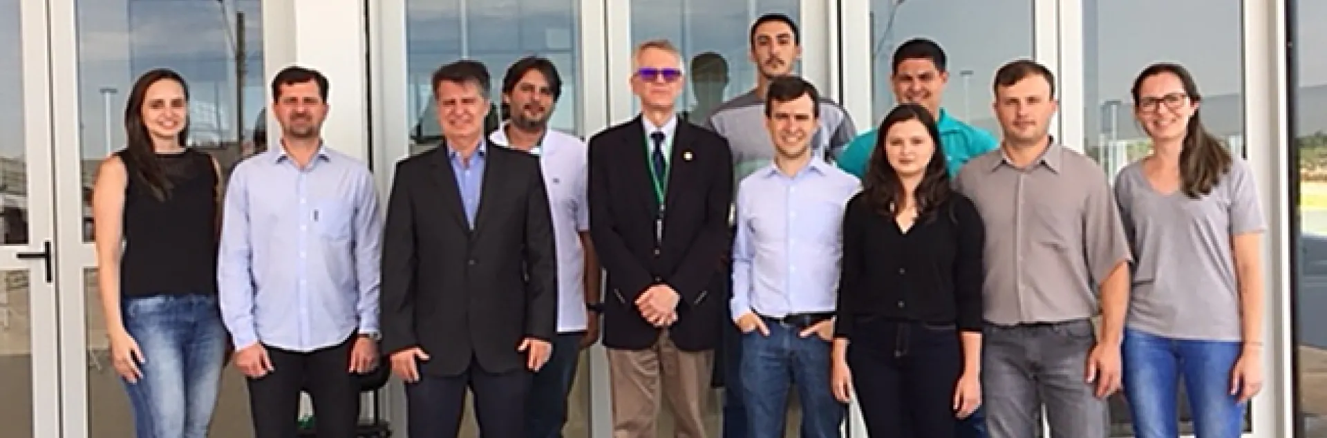 The Asian Citrus Psyllid Team: Scientists in the front row (from left) are Tatiana Mulinari, Rodrigo Magnani, Antonio Juliano Ayres, Walter Leal, Marcelo Miranda, Victoria Esperanca, Odimar Zanardi, and Rejane Luvizotto. The three scientists in back are Haroldo X. L. Volpe (white shirt) Renato de Freitas and Rômulo Carvalho.
