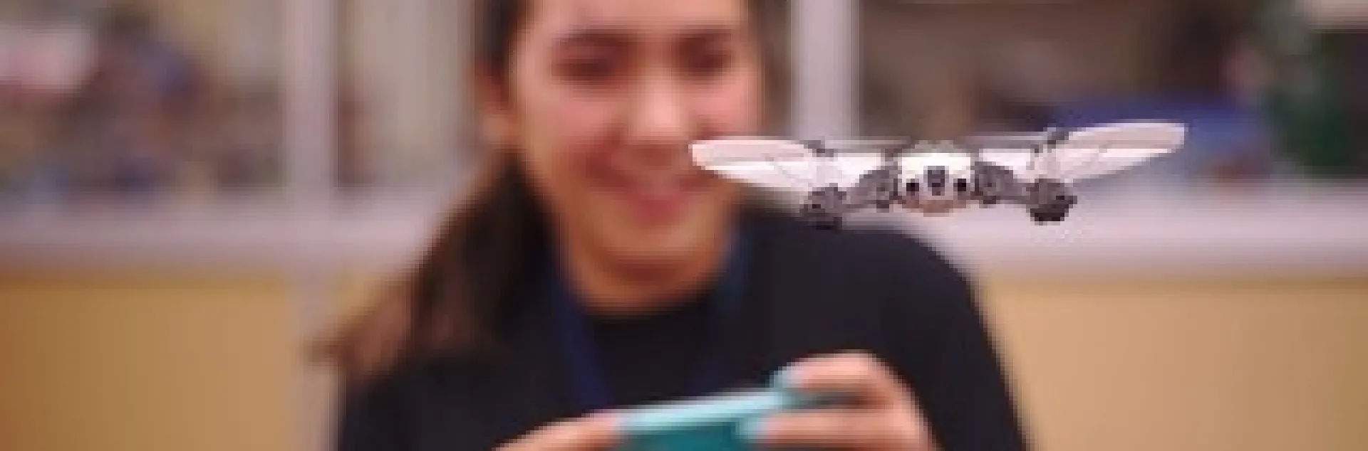 Fiona (teen leader) flying a drone