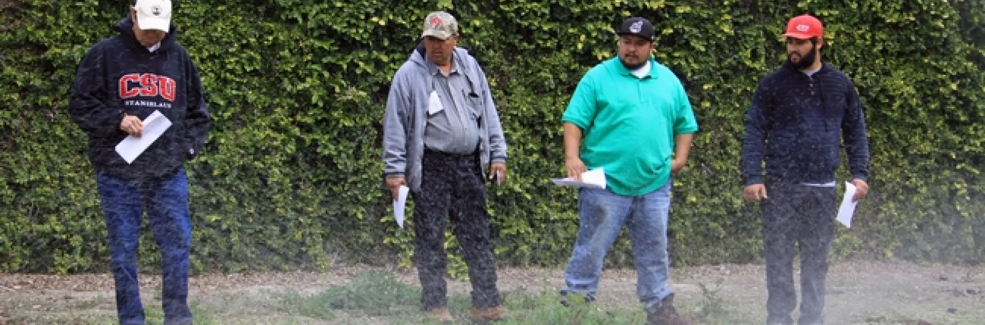 Green Gardener training participants conduct a sprinkler test.