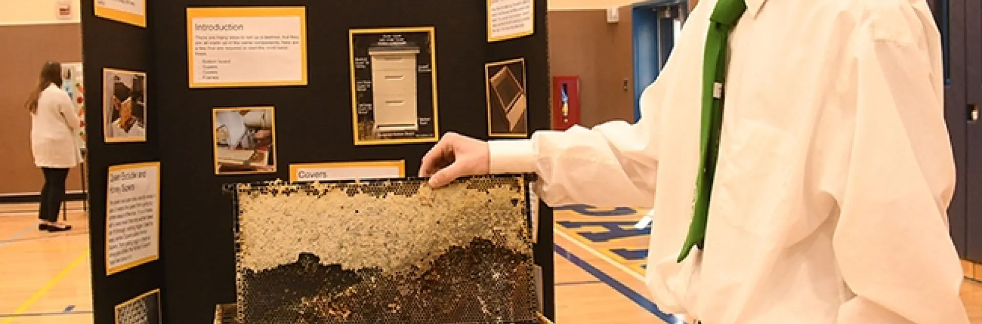 Ian Weber of the Vaca Valley 4-H Club, a second-year beekeeper, displays his project at the Solano County 4-H Project Skills Day. He won a showmanship award. (Photo by Kathy Keatley Garvey)