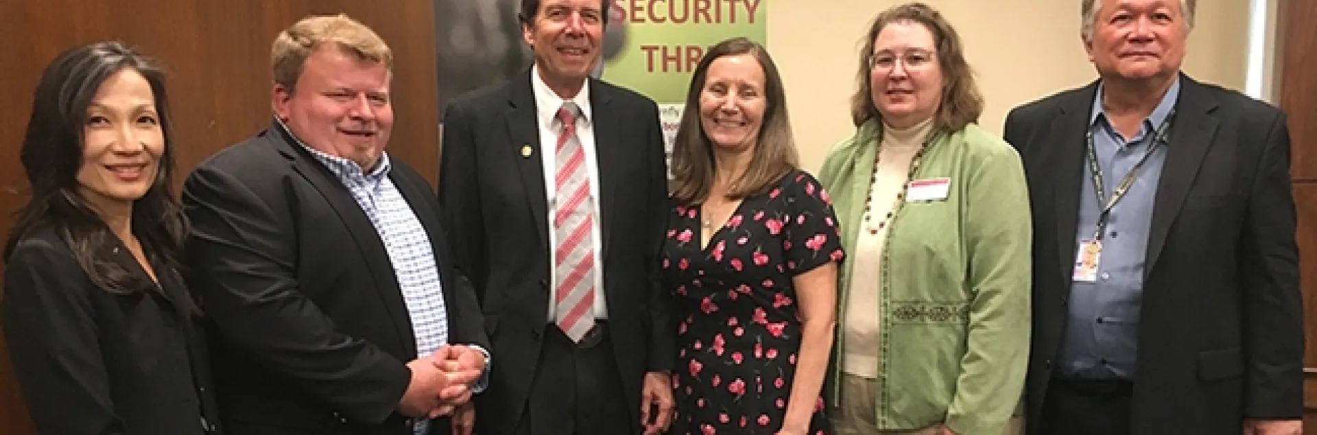 The panel gathers for a group photo following the congressional briefing. From left are Faith Oi, University of Florida; Lee Van Wychen, Weed Science Society of America; moderator Frank Zalom of UC Davis Department of Entomology and Nematology and a past president of the Entomological Society of America; Paula Shrewsbury of the University of Maryland; Kelley Tilmon of Ohio State University; and Dave Chun, chief of staff for Rep. Tulsi Gabbert. (Photo by Chris Stelzig)