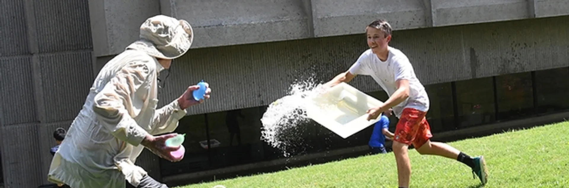 Scene One: UC Davis undergraduate student Andrew Kisin of the Aldrin Gomes lab, charges toward distinguished professor Bruce Hammock. (Photo by Kathy Keatley Garvey)