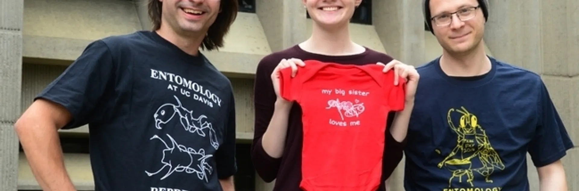 EGSA members and their award-winning t-shirts: president Brendon Boudinot; EGSA t-shirt coordinator Jill Oberski; and Corwin Parker. (Photo by Kathy Keatley Garvey)