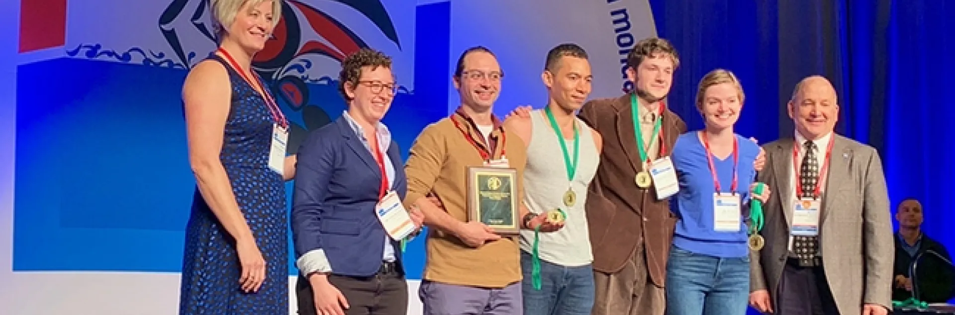 Gamemaster Deane Jorgensen (far left), research scientist at Sygenta, and ESA president Michael Parrella (far right), dean of the College of Agricultural and Life Sciences, University of Idaho, flank the national Linnaean Games Team champions. In the center (from left) are Emily Bick, Brendon Boudinot, captain Ralph Washington Jr., Zachary Griebenow and Jill Oberski. Parrella is a former professor and chair of the UC Davis Department of Entomology and Nematology. (Joe Rominiecki Photo)