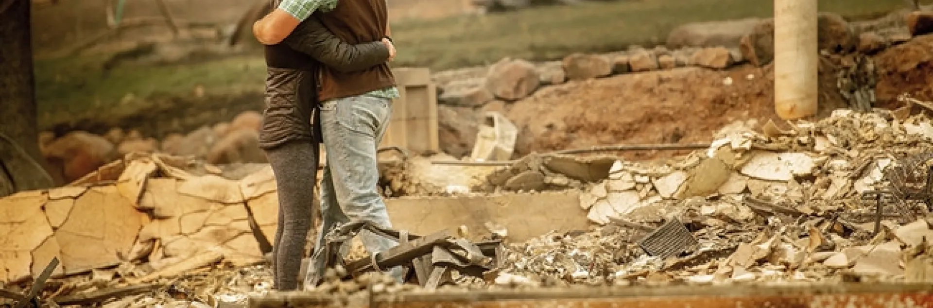 Chris and Nancy Brown embrace while searching through the remains of their home, leveled by the Camp Fire in Paradise, California
Noah Berger/AP