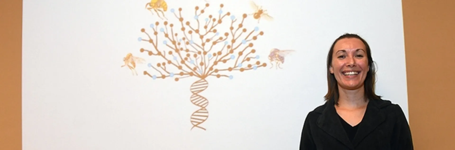 Entomologist Jessica Gillung stands by her exit seminar slide. (Photo by Kathy Keatley Garvey)