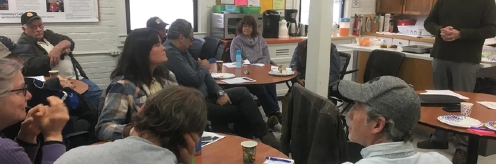 Domenic Fino talks with a room of farmers about crop insurance options at the January 9th Farmer-to-Farmer Breakfast in Auburn.