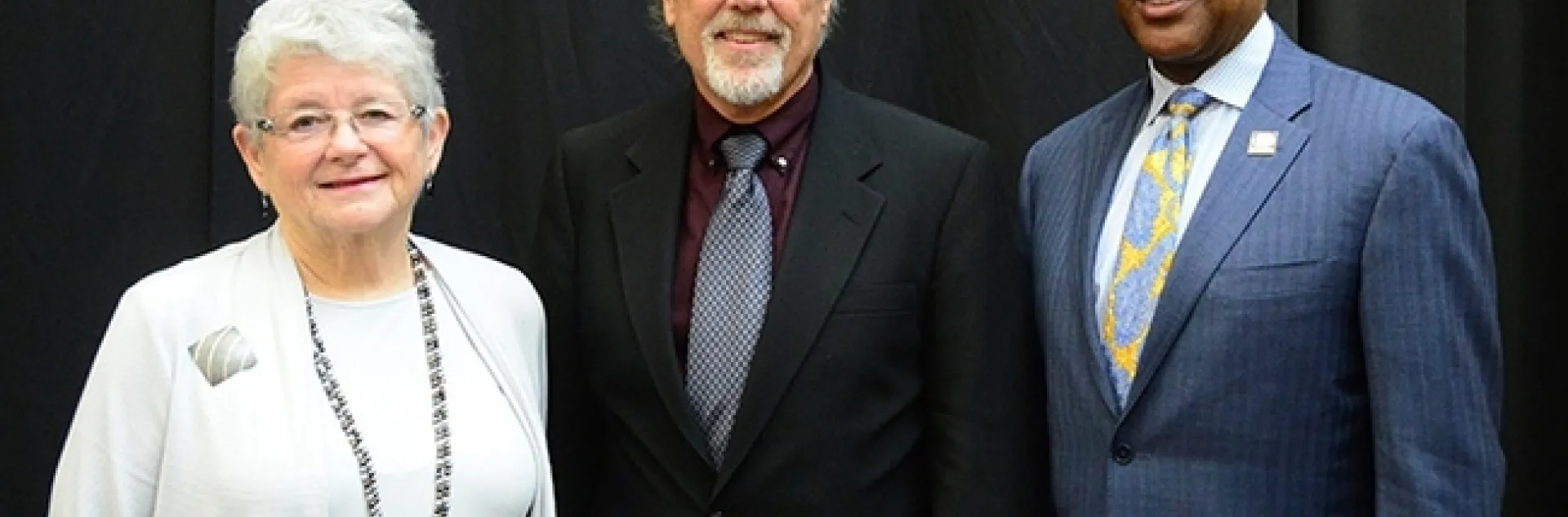 From left are distinguished emerita professor M.R.C. Greenwood, chair of the UC Davis Emeriti Association Awards and Recognition Committee; distinguished emeritus professor Robert E. Page Jr., and UC Davis Chancellor Gary S. May. (Photo by Kathy Keatley Garvey)