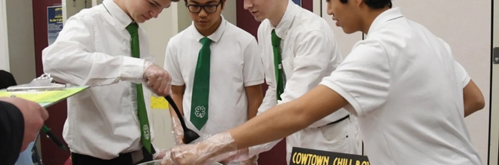 The Cowtown Chili Boys of the Vaca Valley 4-H Club--from left, Xander Lovell, Matthew Agbayani, Ian Weber and Francis Agbayani--test the temperature of their chili at the Solano County 4-H Chili Cook-Off. They went on the win the competition. (Photo by Kathy Keatley Garvey)