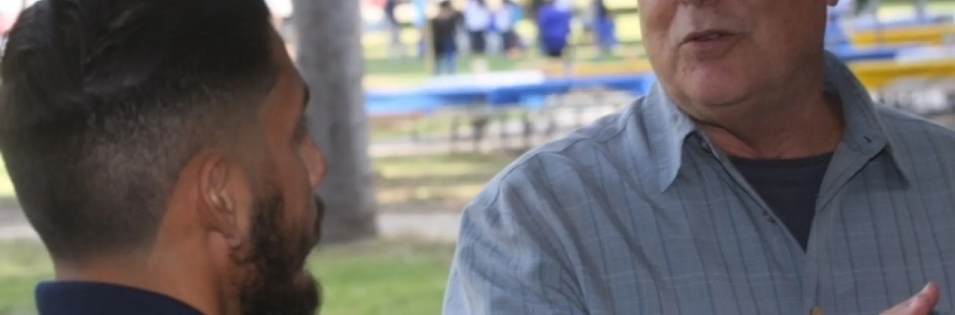 UCCE horticulture advisor Don Hodel, right, said fig trees at El Pueblo de Los Angeles Historical Monument become unhealthy when the ground beneath the canopy was covered with concrete, preventing fallen leaves from decomposing and enriching the soil.
