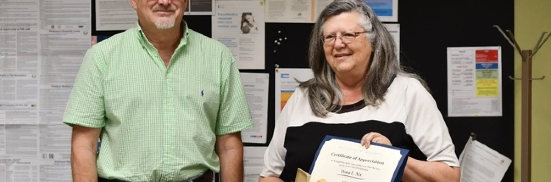 Director Jeff Dahlberg thanks Diana Nix at her celebration.