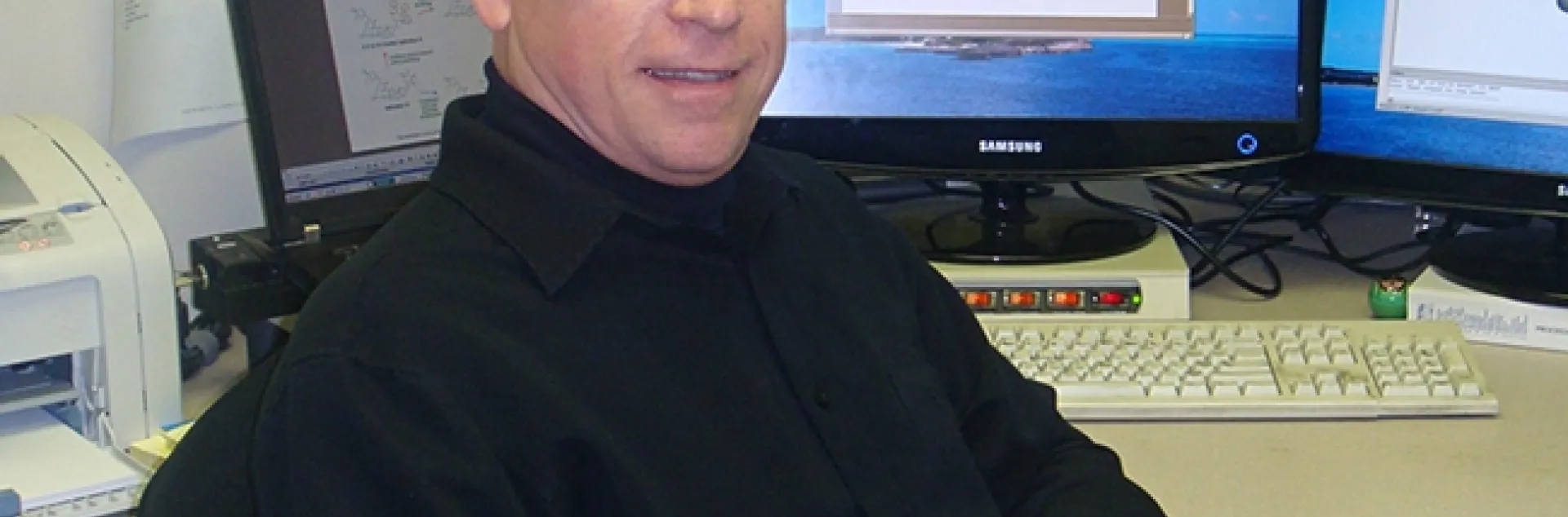 Thomas Sparks at his desk. He was the first graduate student of UC Davis distinguished professor Bruce Hammock.