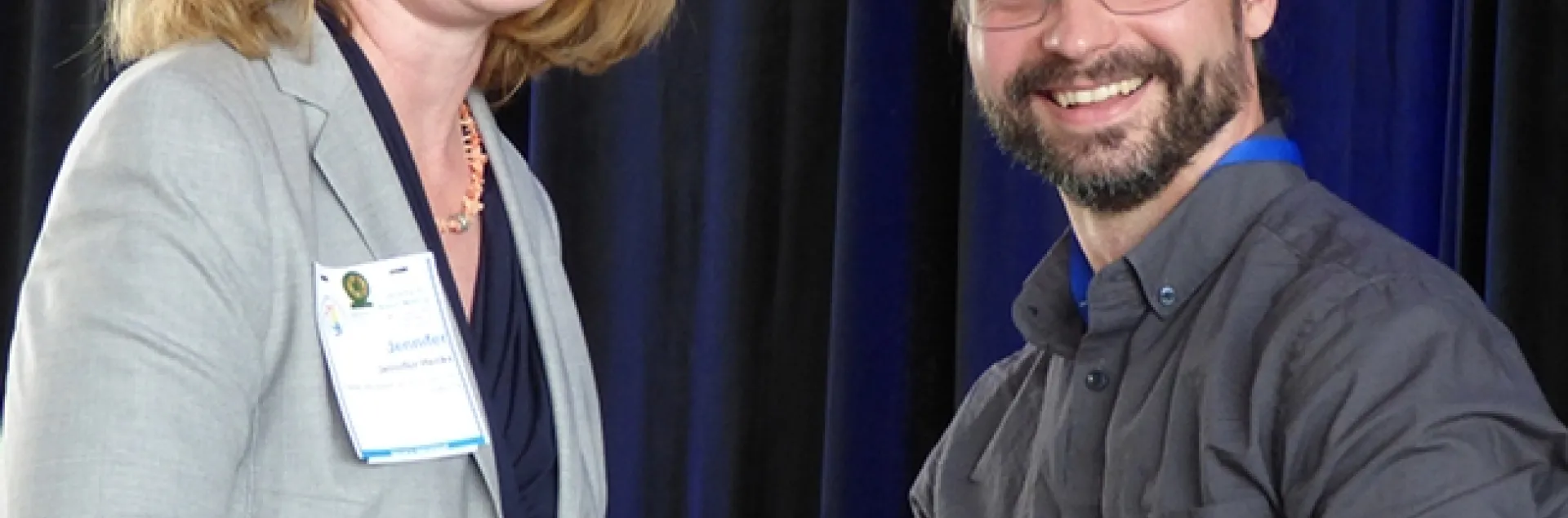 Brendon Boudinot receiving the John Henry Comstock Award earlier this year at a meeting of the Pacific Branch, Entomological Society of America (PBESA). With him is PBESA president Jennifer Henke. He will be honored at the ESA meeting in November in St. Louis. (Photo by Harvey Yoshida)