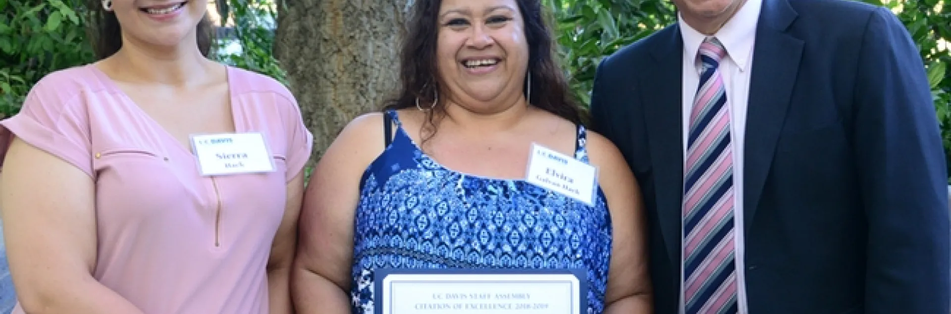 Elvira Galvan Hack (center) with Provost and Executive Vice Chancellor Ralph Hexter, and her daughter, Sierra Hack. (Photo by Kathy Keatley Garvey)