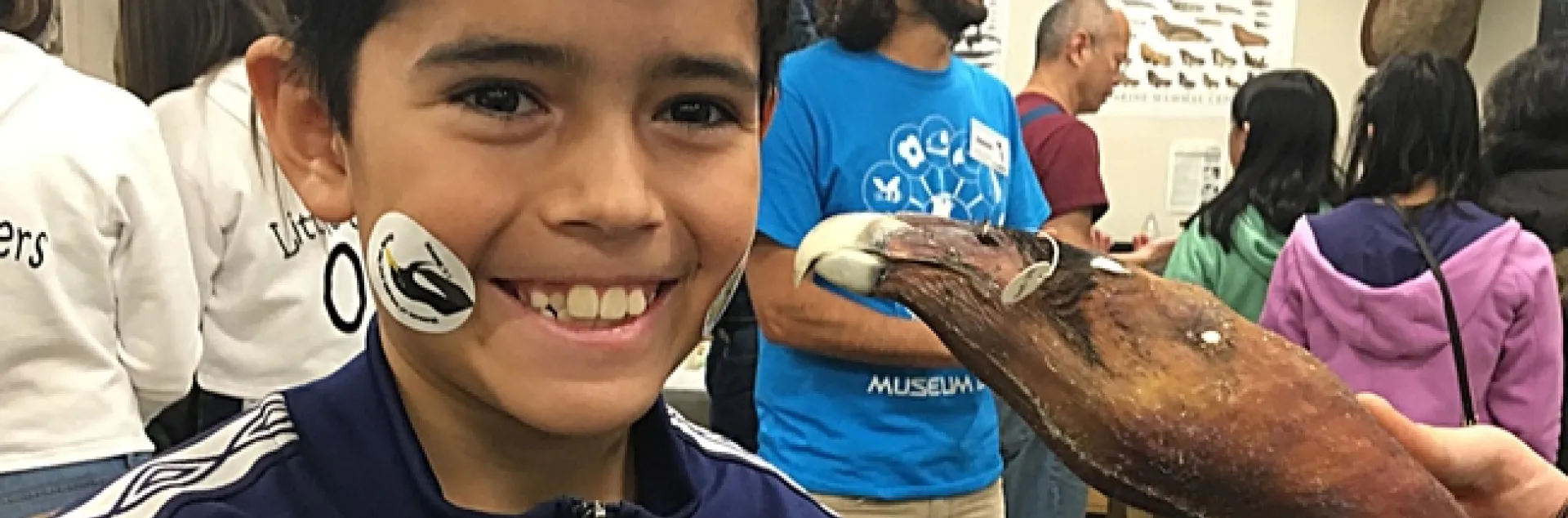 Jefferson Wright, an eighth grader at Emerson Middle School, Davis, enjoys attending the annual UC Davis Biodiversity Museum Day. "I have always liked museum day and every year It gets better and better. I can't wait to go this year!" He's pictured in the Museum of Wildlife and Fish Biology.
