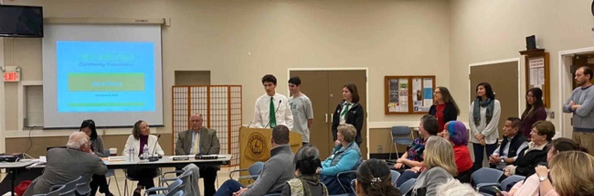 Club President Tristan speaking at the San Bruno Community Foundation meeting