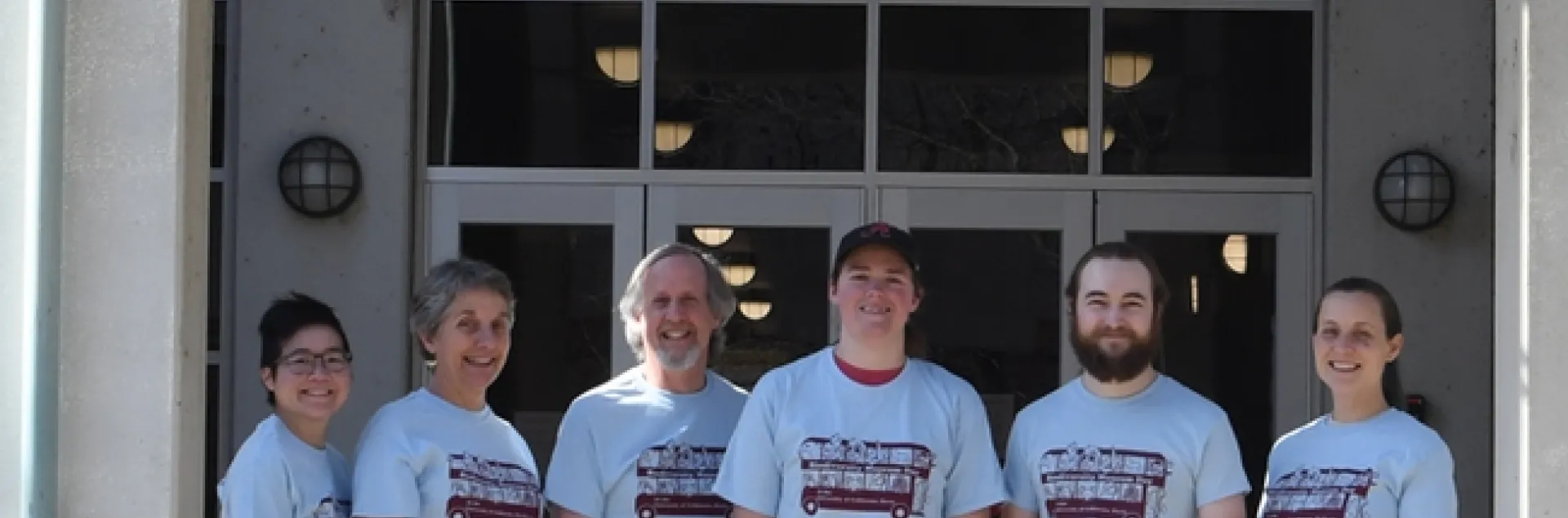 Ready for UC Davis Biodiversity Museum Day are scientists (from left) Ivana Li, biology lab manager; Lynn Kimsey, director of the Bohart Museum of Entomology; Steve Heydon, Bohart Museum senior museum scientist; Lacie Newton, doctoral student, Jason Bond lab; Brennen Dyer, lab assistant, Bohart Museum; and Rebecca Godwin, doctoral candidate, Jason Bond lab. In front is Juniper, Ivana Li's dog. (Photo by Kathy Keatley Garvey)