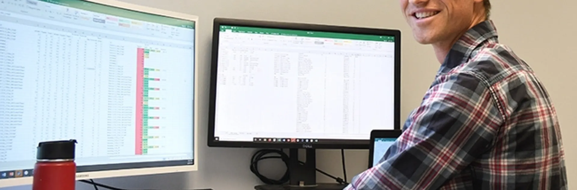 Cooperative Extension specialist Ian Grettenberger at his office in 73 Briggs Hall. (Photo by Kathy Keatley Garvey)