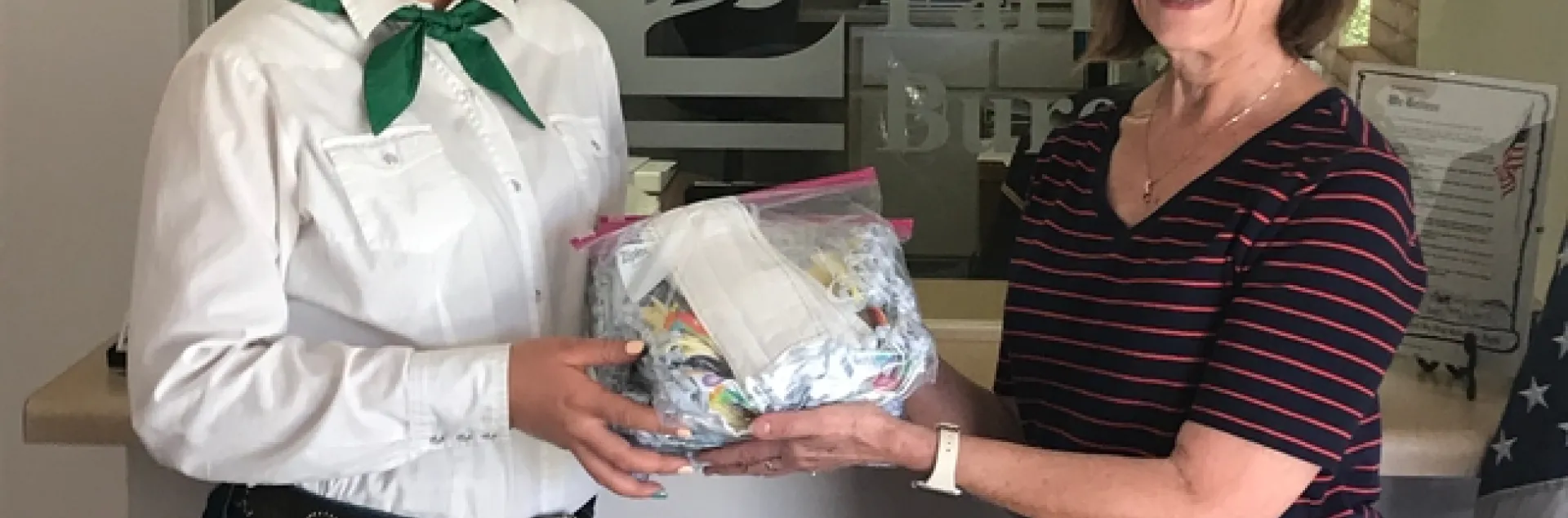 Olivia delivering 100 face masks to the Santa Barbara Farm Bureau.