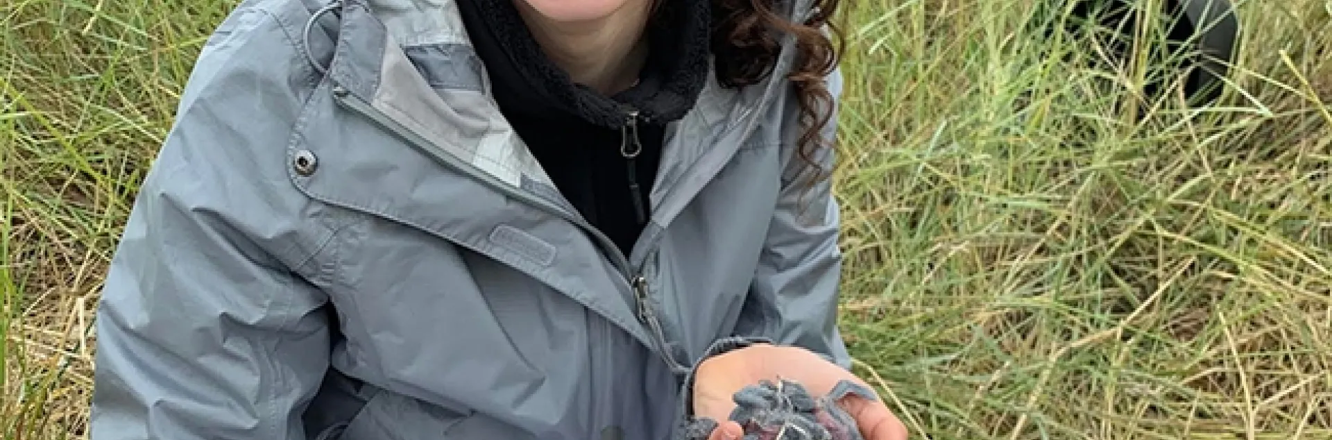 Naomi Murray, a third-year student at UC Davis, shown here doing field work in Davis, anticipates receiving her bachelor of science degree in evolution, ecology and biodiversity in June 2021. (Photo by Alicia Bird)