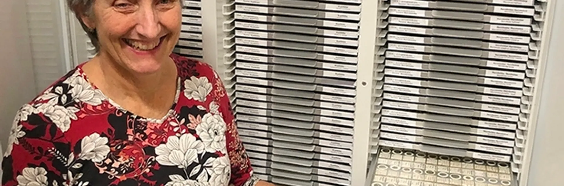 Lynn Kimsey, director of the Bohart Museum of Entomology, with part of the museum's tardigrade collection. (Photo by Kathy Keatley Garvey)