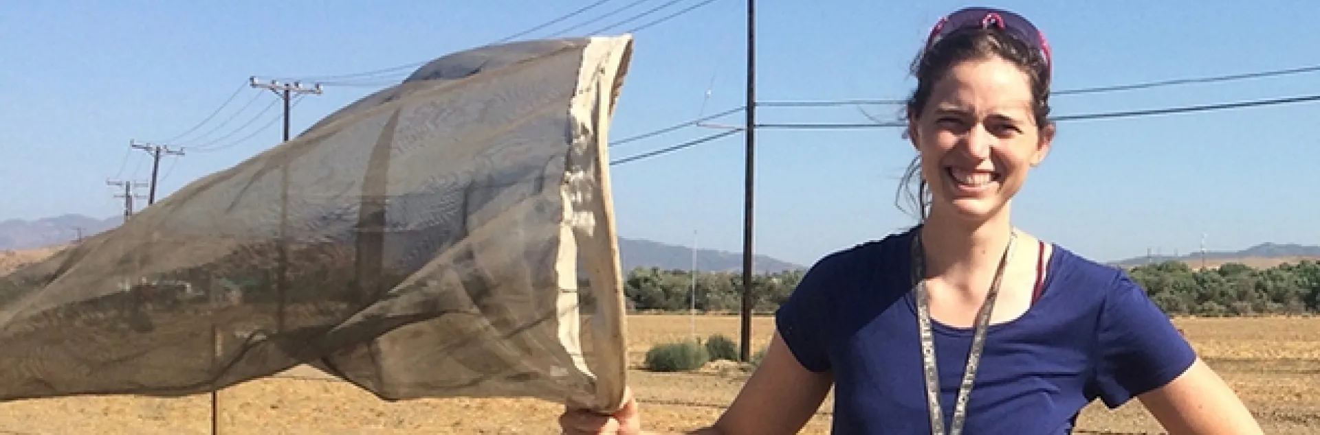 Doctoral student Erin Calfee with her collecting net.