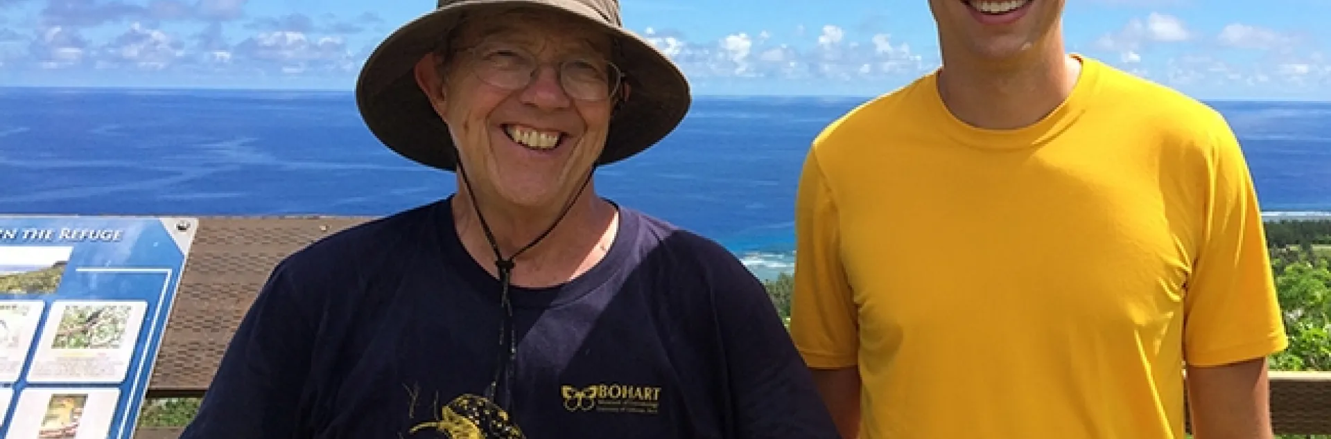UC Davis emeritus professor Hugh Dingle, wearing a Bohart Museum t-shirt, and then doctoral student Micah Freedman, did monarch research on Guam.
