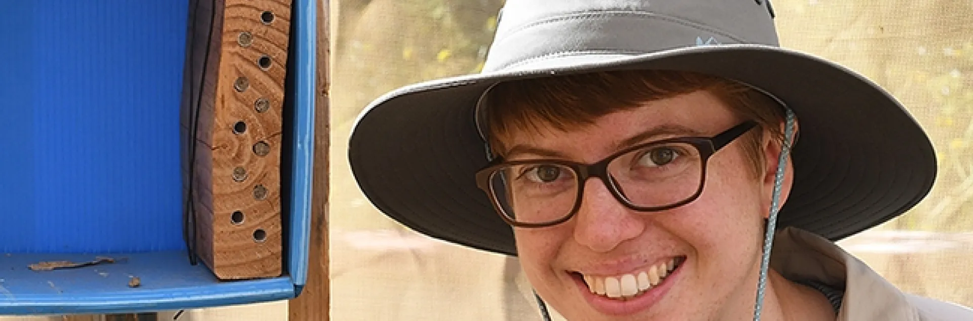 UC Davis doctoral student Clara Stuligross by her blue orchard bee nests in the spring of 2018. (Photo by Kathy Keatley Garvey)