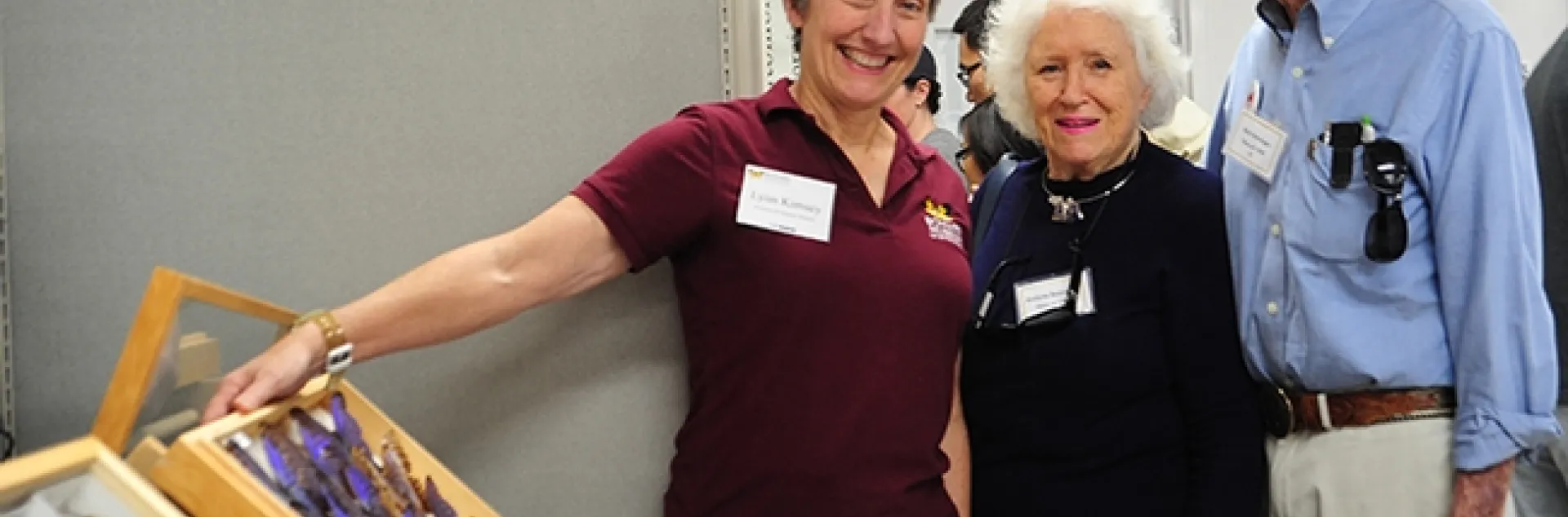 Lynn Kimsey (left), director of the Bohart Museum of Entomology and professor of entomology at UC Davis, shows Richard and Evelyne Rominger a display at the Bohart Museum on UC Davis Picnic Day, April 17, 2015. The Romingers are both UC Davis alumni. (Photo by Kathy Keatley Garvey)