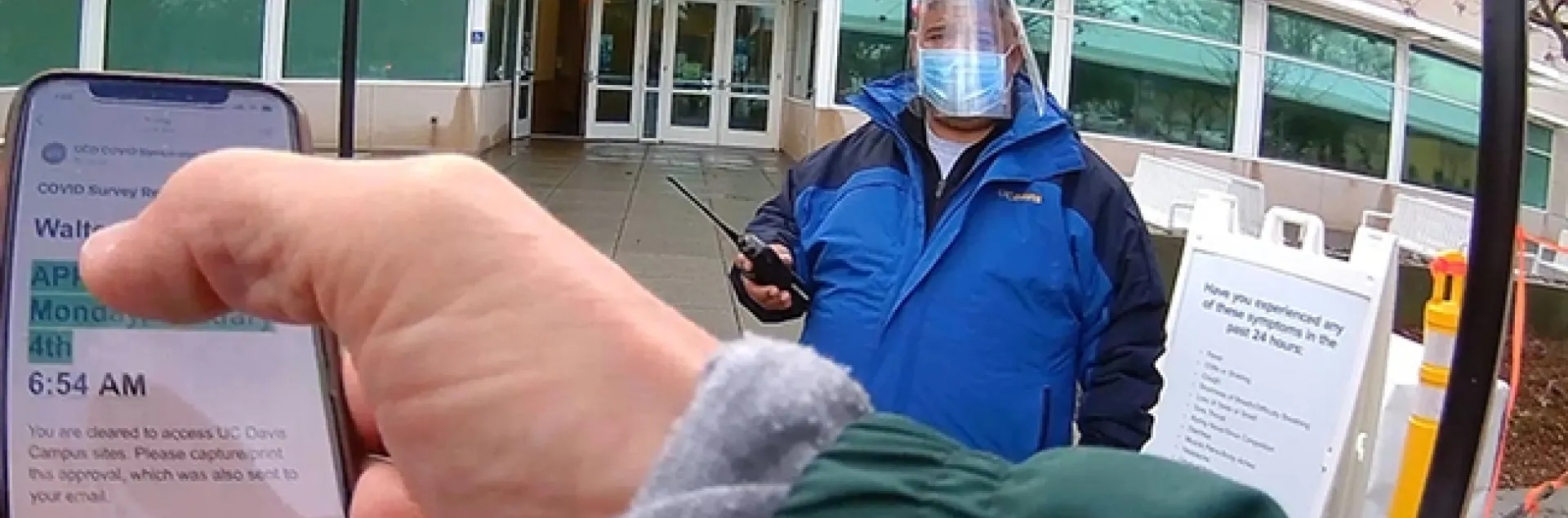 UC Davis distinguished professor Walter Leal is his way to obtain a COVID-19 saliva test at a UC Davis kiosk. The saliva tests are given, by appointment, to members of the UC Davis and Davis communities. (Photo by Walter Leal)