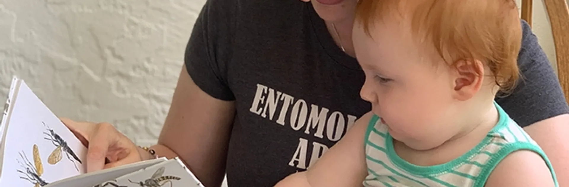 UC Davis doctoral candidate Charlotte Herbert Alberts reads to her son, Griffin, born in April of 2020.