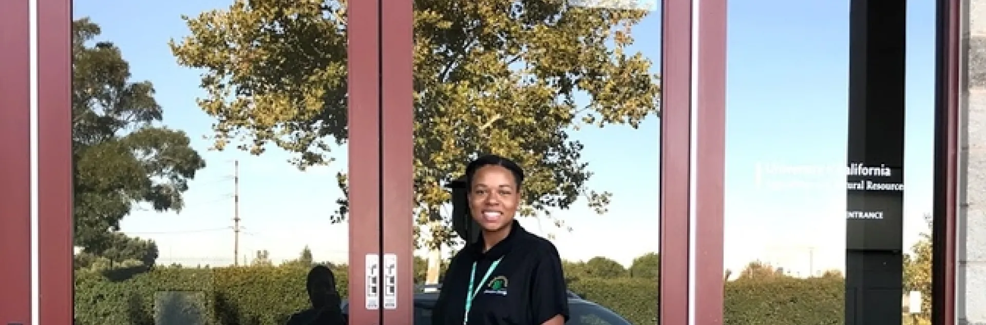 Eve outside at doorway to Valley Conference Center