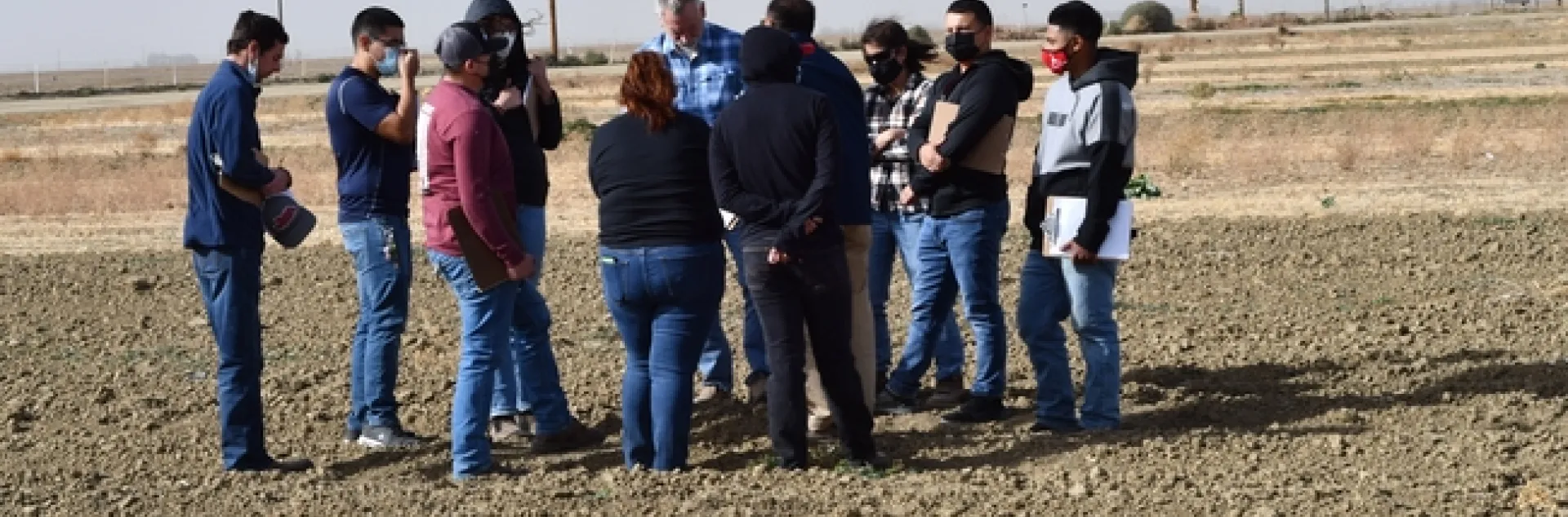 Photo 1.	Fresno State University agronomy students tour the 22-year conservation agriculture systems comparison field at the UC West Side Research and Extension Center in Five Points, CA on October 11, 2021. The group was hosted by Dan Munk, Joy Hollingsworth, and Jeff Mitchell.