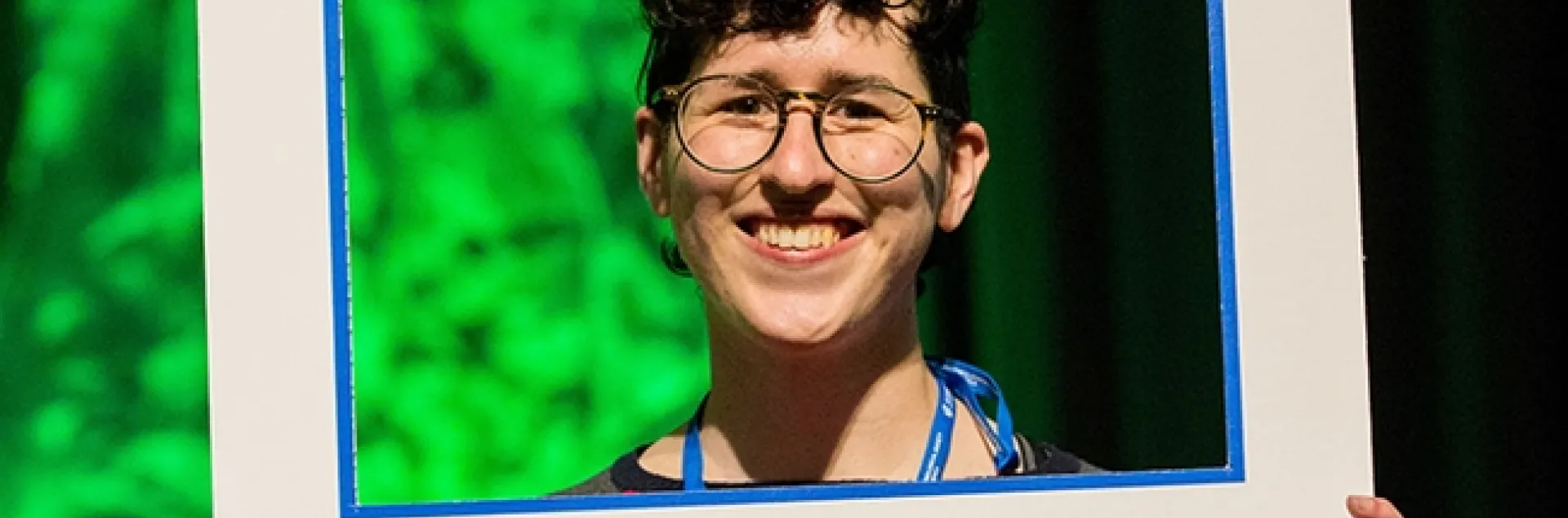 UC Davis doctoral student Danielle Rutkowski--framed--as the winner of a President's Prize at the Entomological Society of America meeting. (Photo by Entomological Society of America/Photography G)