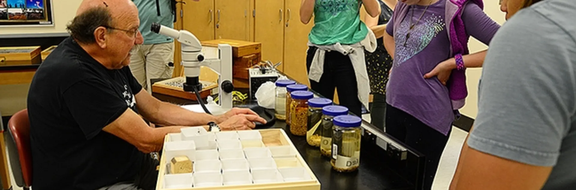 Visitors at the 2019 UC Davis Picnic Day take images of forensic entomologist Robert Kimsey of the UC Davis Department of Entomology and Nematology and his display. (Photo by Kathy Keatley Garvey)