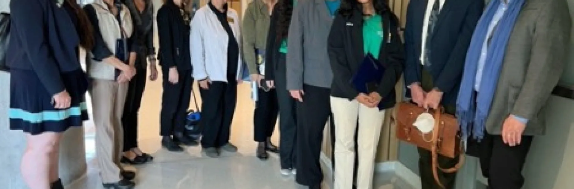 The UC ANR delegation gathers in the new state legislative office building: from left, Sarah-Mae Nelson, Dorina Espinoza, Mae Culumber, Christina Harrington, Clio Tarazi, Kamal Khaira, Sara Tibbets, Glenda Humiston, Megna Nayar, Igor Lacan and Mark Bell.