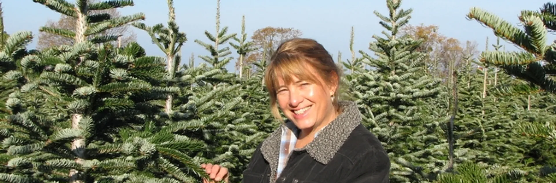 Lynn Wunderlich with Nordmann fir
