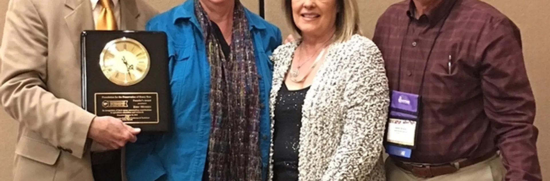Eric Mussen (far left) received the prestigious Founders' Award from the Foundation for the Preservation of Honey Bees at the 75th annual American Beekeeping Federation conference in Reno in 2018. With him are his wife, Helen, and close friends Christine and Gene Brandi of Los Banos. Gene, the 2018 president of the American Beekeeping Federation, presented him with the award.