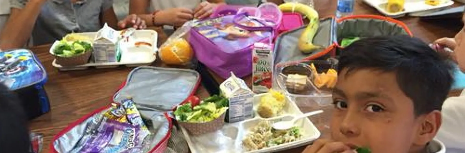 Students eat school lunch