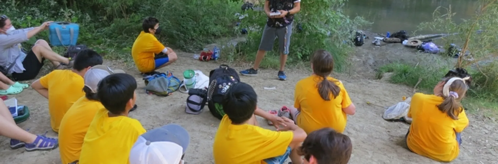 UC Davis student Christofer Brown presents a program on dragonflies to middle schoolers enrolled in the UC Davis Bio Boot Camp, held in the summer of 2022. This image was taken by Putah Creek. (Tabatha Yang Photo)