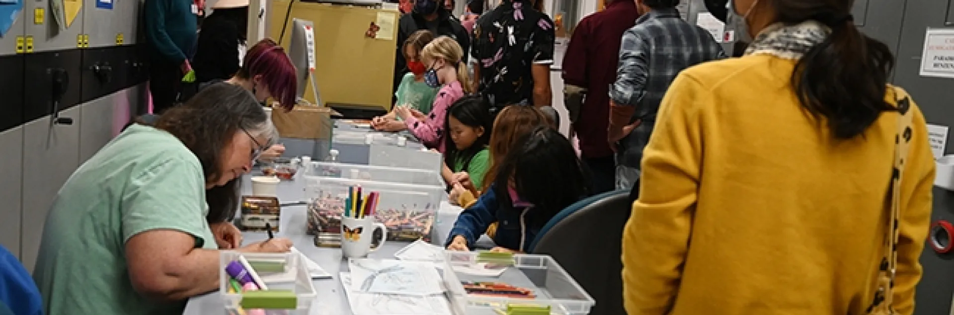 The arts-and-crafts activity at the Bohart Museum's dragonfly open house was a popular site. In the back (at left) is noted dragonfly expert Rosser Garrison of Sacramento. (Photo by Kathy Keatley Garvey)