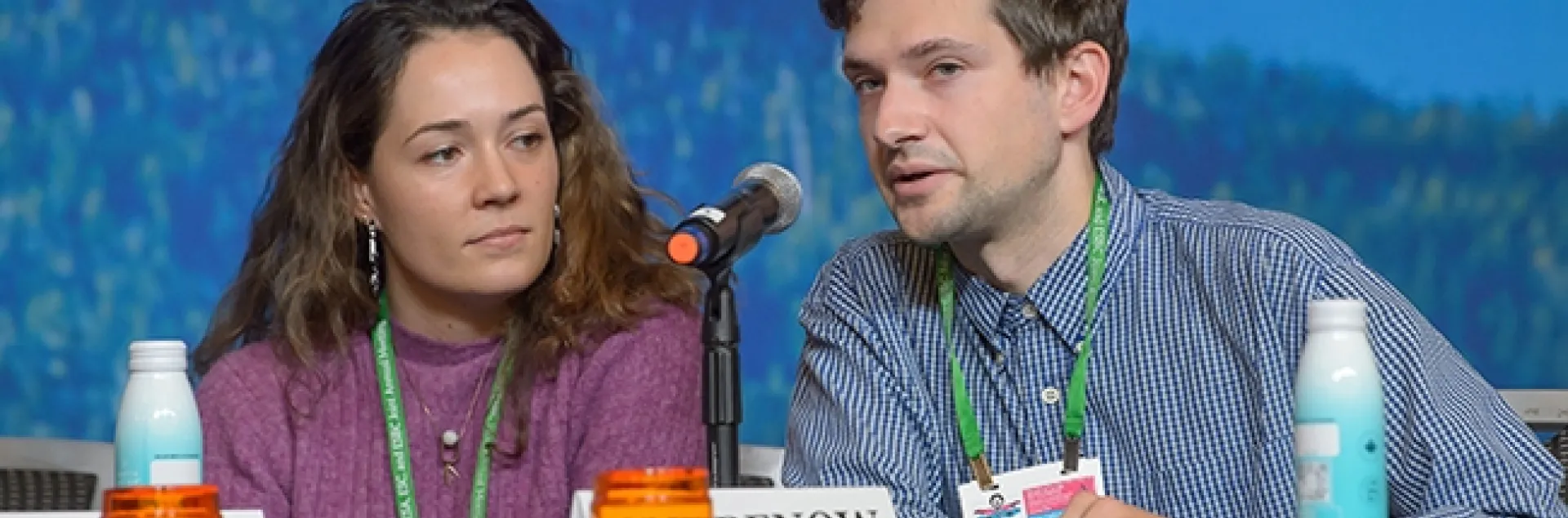 In the preliminaries, UC Davis doctoral candidate Zach Griebenow answers a question while team member, UC Davis doctoral candidate Erin "Taylor" Kelly waits for her turn. (Photo courtesy of ESA)