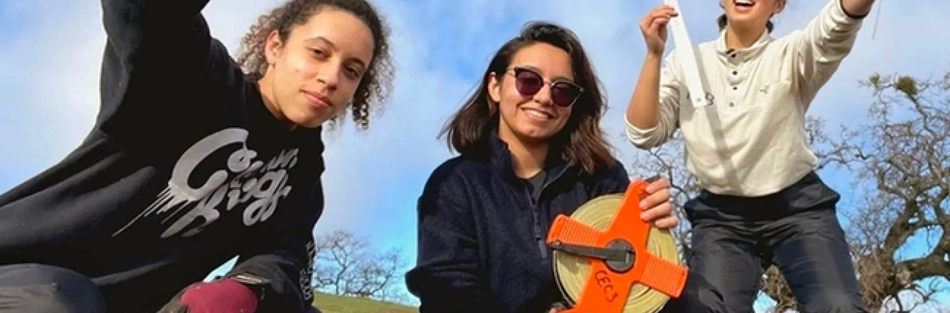 Bita Rostami (center) with fellow researchers, Logan Ruggles and Marissa Lopez, at the Blue Oak Ranch Reserve in San Jose. This project was part of the California Ecology and Conservation, UC Natural Reserve System. They were measuring the abundance of yarrow, Achillea millefolium, in burned out areas and unburned areas of the reserve. (Photo by Logan Ruggles)