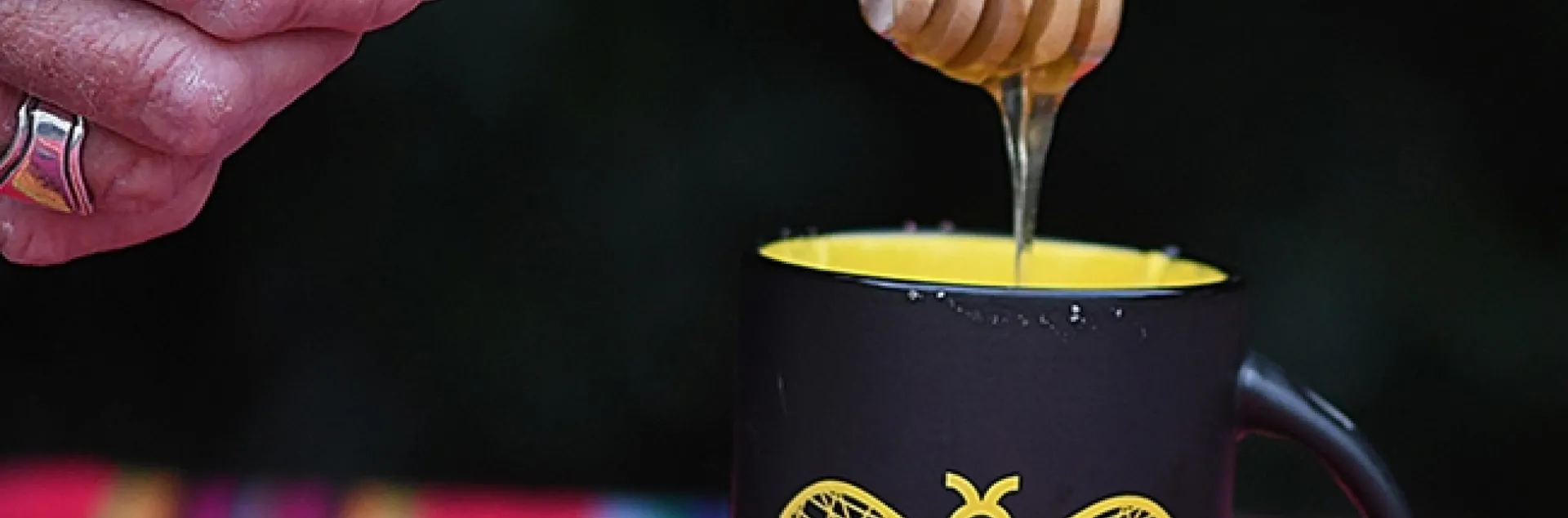 A dipper of honey for your tea? Sweet! (Photo by Kathy Keatley Garvey)