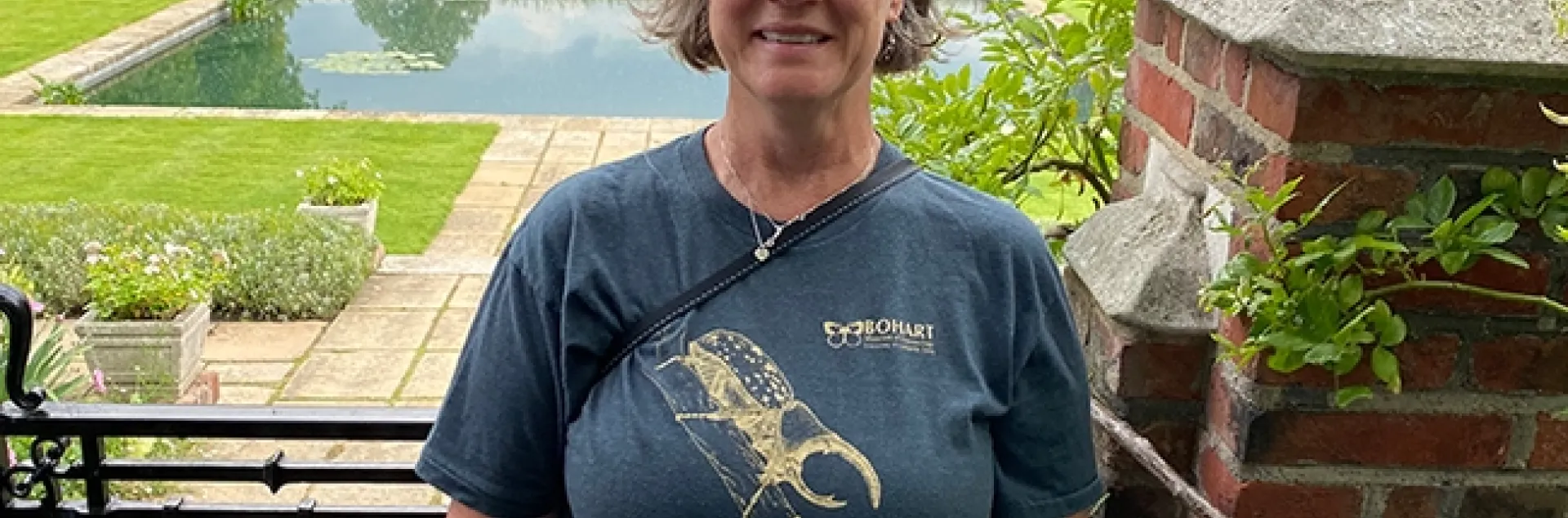 Professor Fran Keller of Folsom Lake College and a Bohart Museum of Entomology scientist, is shown here wearing her Bohart Museum rhinoceros beetle shirt at Kensington Palace. Keller taught science to community college students in London during the fall semester. She designed this beetle, which is available in the Bohart Museum gift shop.