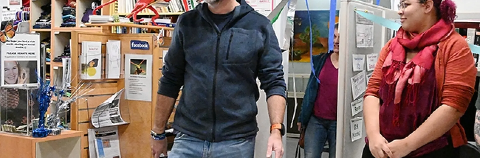 Associate dean Jason Bond leads professor Lynn Kimsey into the Bohart Museum after informing her of "the water leakage." At right is doctoral student Iris Quayle from the Bond lab.(Photo by Kathy Keatley Garvey)