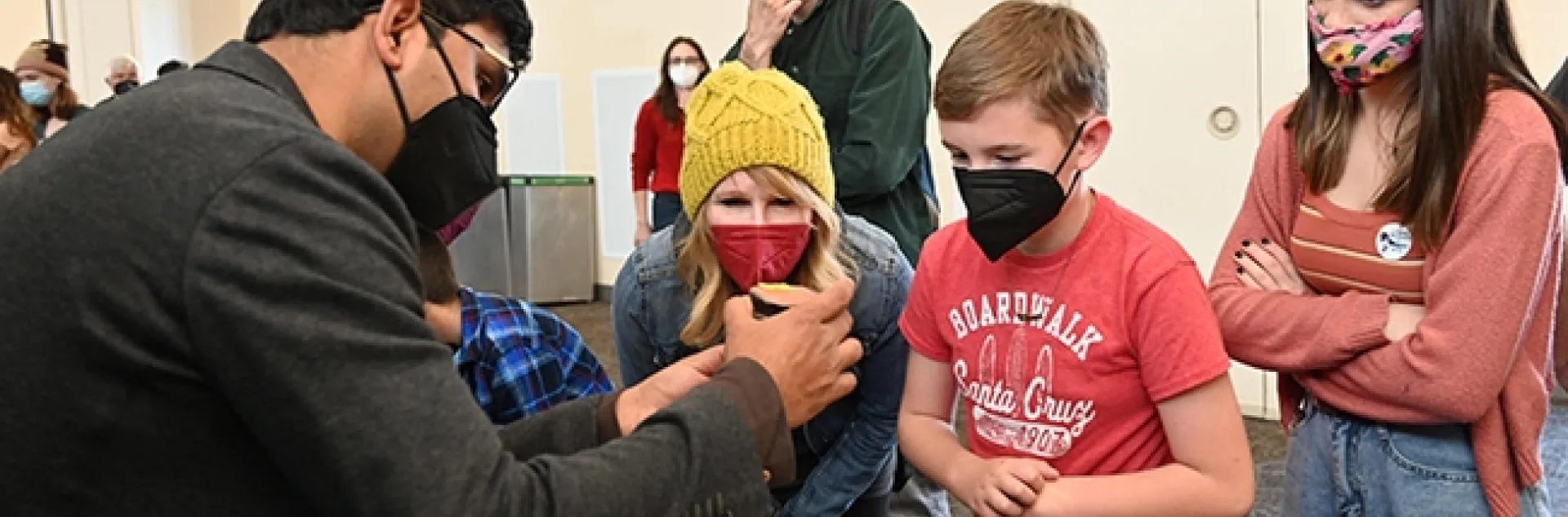 Nematologist Shahid Siddique explains some of the display items during a previous UC Davis Biodiversity Museum Day. (Photo by Kathy Keatley Garvey)