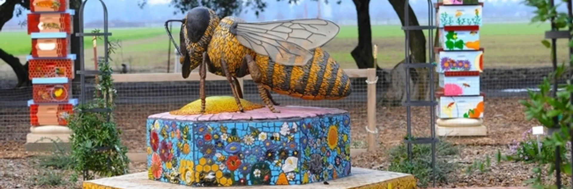 A mosaic-ceramic sculpture of Miss Bee Haven, the work of Donna Billick of UC Davis, anchors the UC Davis Bee Haven. (Photo by Kathy Keatley Garvey)